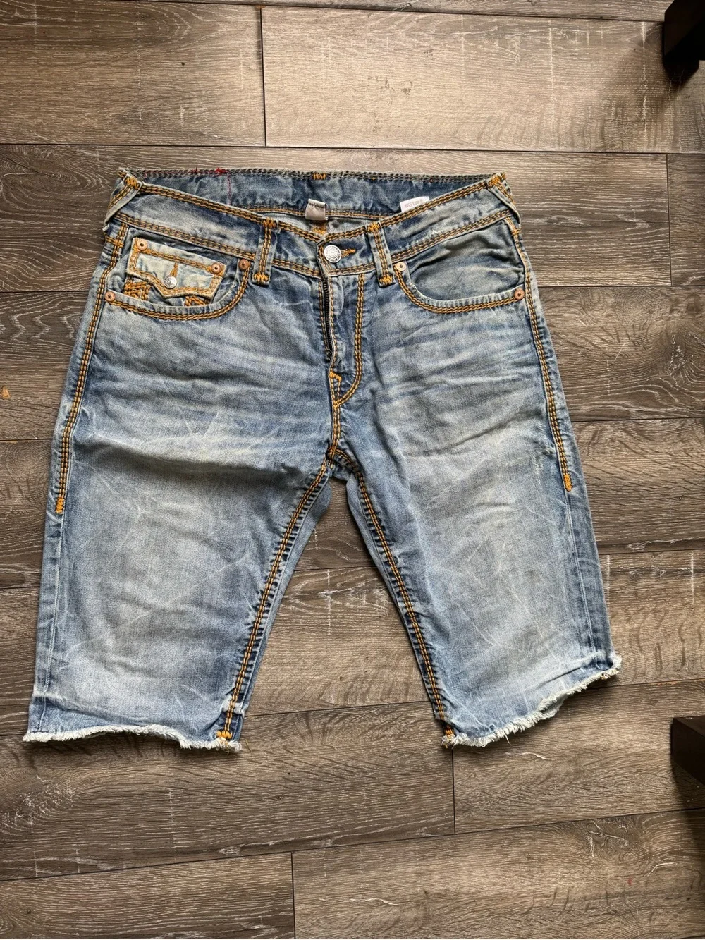 True Religion Light Wash Denim Shorts with Orange Topstitching